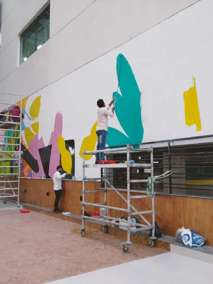 The early stages of the Hyderabad mural, with big, bold shapes starting to fill the wall.