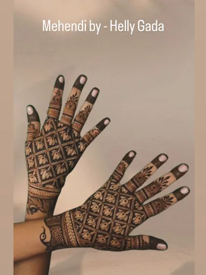 This back-hand design features a repeating pattern of lotus flowers within a diamond grid, creating a beautiful and uniform look. The detailed finger work complements the intricate palm design perfectly.