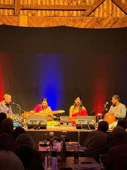 A view from the audience at our concert in Sontheim, Germany. The stage lighting and the rustic wooden hall created a magical atmosphere for the performance.