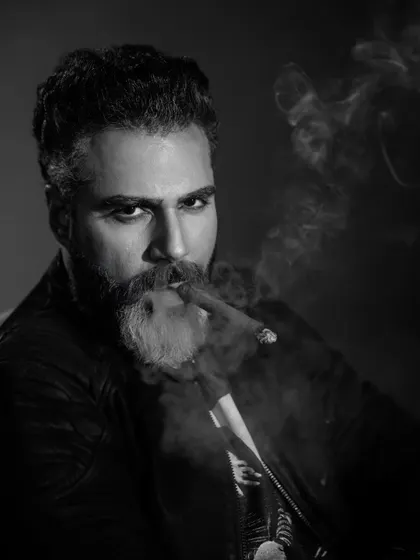 This is what I mean by cinematic. A black and white portrait where mood and presence do all the talking. We used a single light source and minimal direction to capture this intense, story-rich moment in our studio.