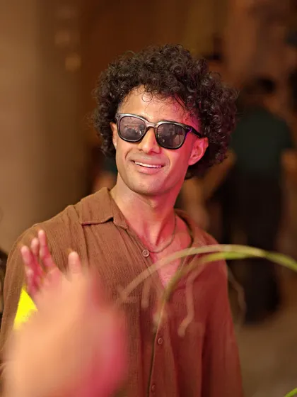 The stylish crowd that pulls up every week. A guest enjoying the good vibes and cool atmosphere of our rooftop party.