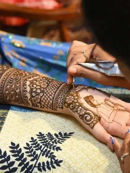 This is where the magic happens. A little glimpse of me in my element, carefully drawing a bride's story. Every single line is drawn with love and devotion.