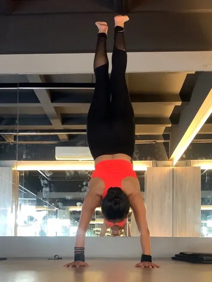 Handstand everywhere. Whether in the studio or at the gym, taking a moment to go upside down always feels refreshing and empowering.