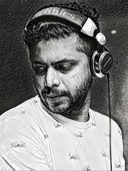 A stylized, black and white portrait. It captures the more serious and focused side of my craft as a musician and DJ.