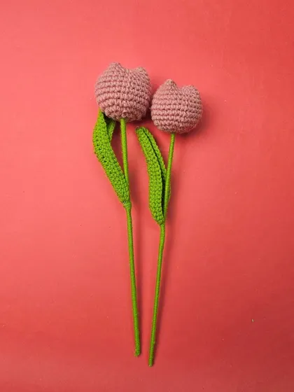 These soft pink crochet tulips are handcrafted with love and add a beautiful, personal touch to our gift hampers.