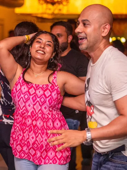 A moment of pure joy and laughter on the dance floor.