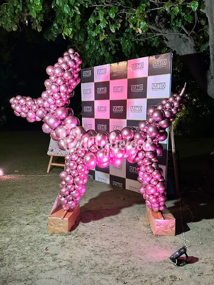 This giant pink balloon dog was a chic and playful installation for an outdoor event, proving that balloon art can be both fun and high-fashion.