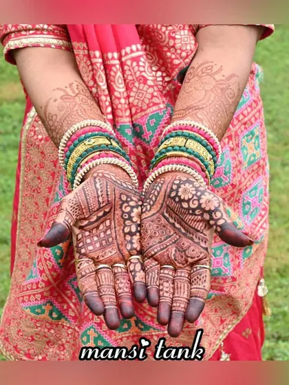 This photo shows the rich 24 hour stain of a detailed bridal mehendi. The design is a mix of traditional Indian patterns, perfect for a groom's sister or a close family member.