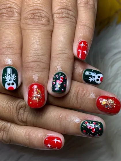 Another angle of this super cute and detailed Christmas character nail art.