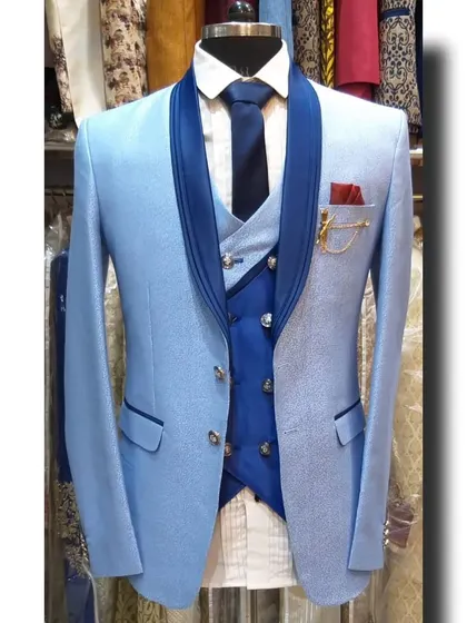 A light blue three-piece suit with a darker blue vest, creating a nice layered look.