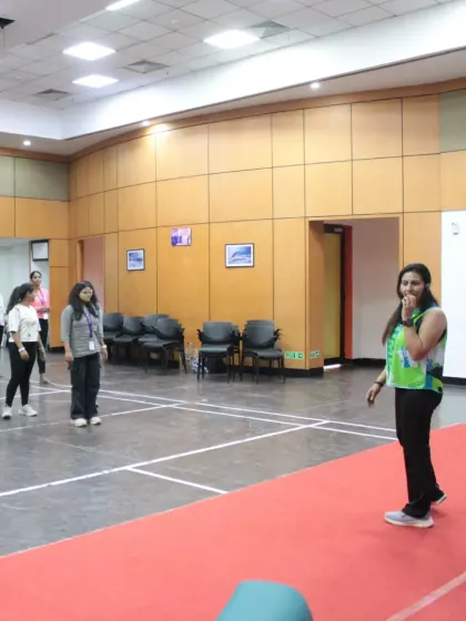 Setting up for a corporate fitness workshop. I make sure every session is well-prepared, creating a welcoming space where employees can step away from their desks and into a zone of positive energy.
