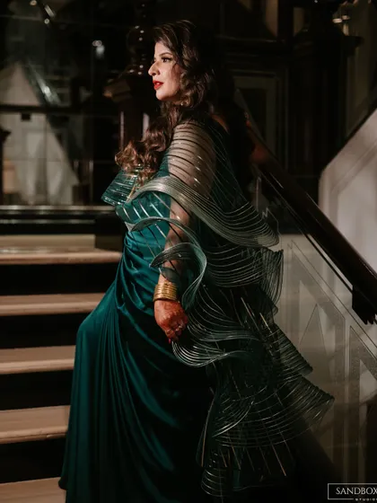 A dramatic and elegant shot of the bride on the stairs. We help scout the best locations at the venue for stunning photographic moments like this one.