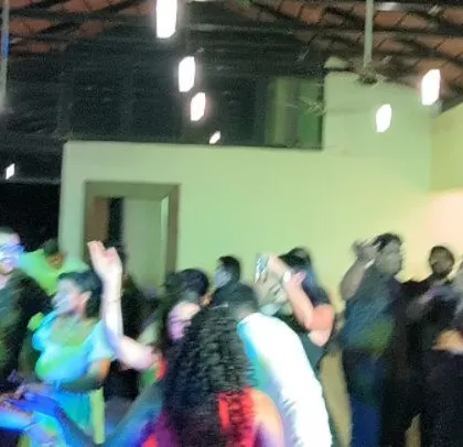 The party is a blur of motion and fun.