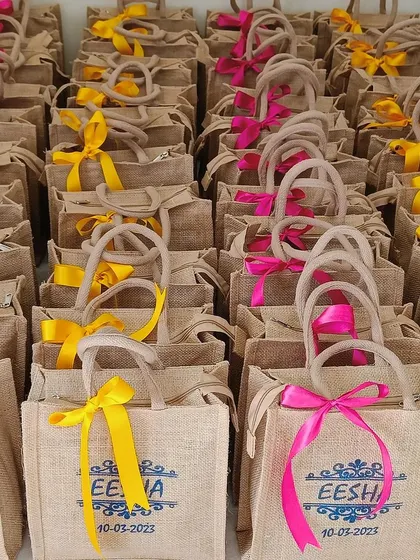 A full view of the neatly arranged rows of personalized jute bags.