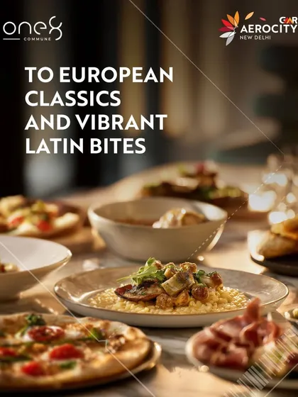 A table at one8 Commune, laden with European classics and vibrant Latin bites. This image shows a variety of dishes, including artisanal pizza and risotto, perfect for a shared dining experience with friends or family.