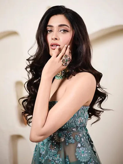 A beauty shot focusing on Geethika's flawless makeup and the gorgeous statement ring that adds a final touch of glamour to her look.