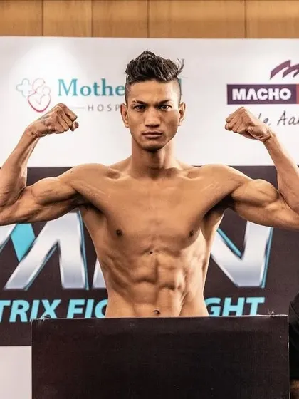 Rahul Thapa, one of my athletes, looking sharp and focused at the MFN weigh-ins. He made weight despite a short camp.