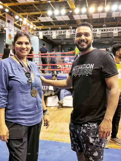 With one of the senior female kickboxers at a national championship. A proud moment for the team.