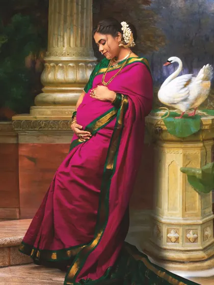 A graceful pose by a pillar with a swan, this image is a direct nod to classic Indian art, reimagined to celebrate motherhood.