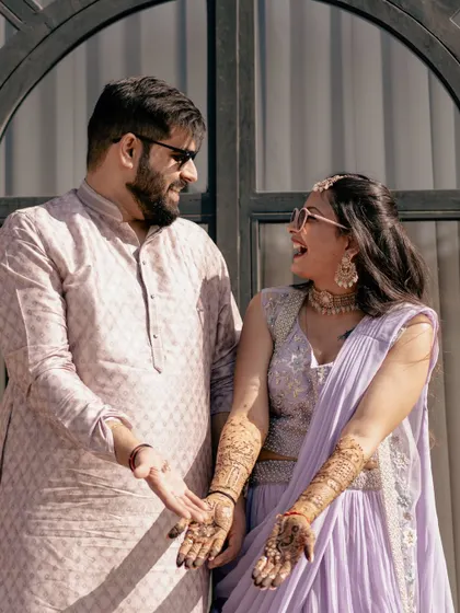 Pure, uninhibited laughter between the couple. These are the candid moments that truly define your love story.