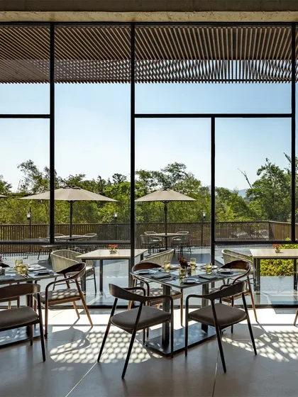 The outdoor dining terrace at the Radisson Resort is an extension of the indoor space, offering guests an opportunity to dine while immersed in the natural beauty of Lonavala.