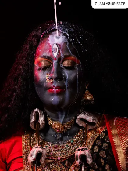 An intense, artistic shot from the Kali photoshoot, capturing a moment of divine power and emotion.