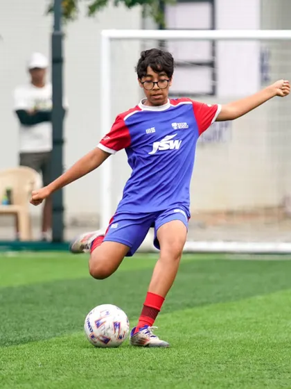 A player practices his shooting technique. We dedicate time to finishing drills to develop clinical goal-scorers.
