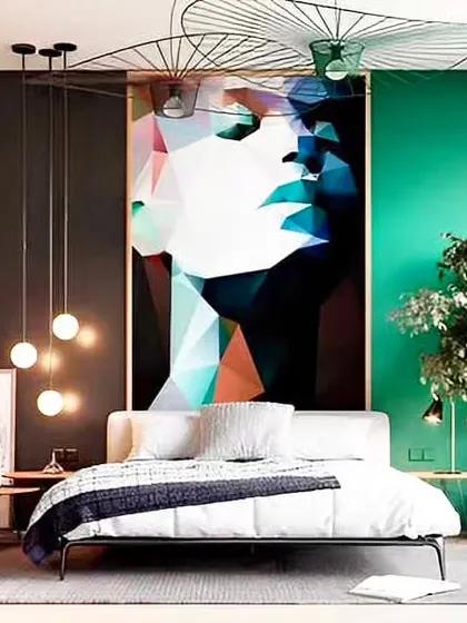 A bedroom that makes a statement with bold color and art. The deep green accent wall and large, abstract painting create a dramatic and stylish backdrop for the minimalist bed frame.