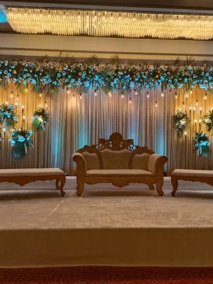 A variation of our reception stage design with cool blue backlighting. This simple change in lighting can completely transform the mood of the event to match your theme.