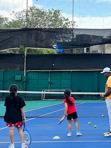 A good coach instills discipline, dedication, and a strong work ethic. Here, one of our experienced coaches, Raghunath Gupta, works with our junior players, focusing on the fundamental skills that are crucial for their long-term development.