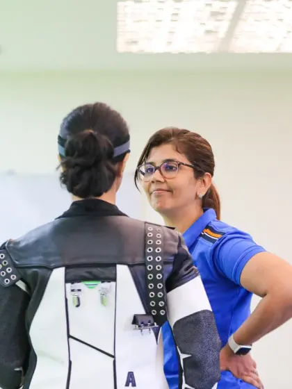 Dronacharya Awardee Suma Shirur provides personalized feedback to a young shooter during our high-performance camp.
