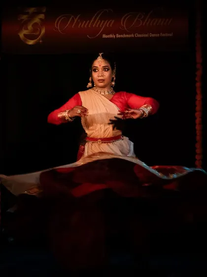 A powerful and grounded pose, highlighting the dancer's control.