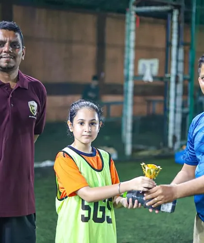 A closer look at Jiya Sadhnani receiving her Girl Player of the Month award from our coaches at the Borivali center.