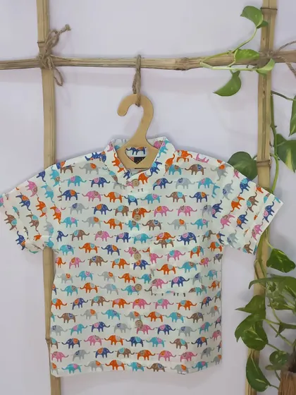 Our colorful elephant print shirt is another fun option for boys. The playful design and soft cotton fabric make it a comfortable and stylish choice for any casual occasion.