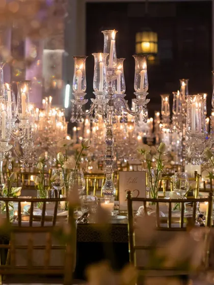 A magnificent crystal candelabra, a key element in creating the palatial, luxurious feel of the sit-down dinner.