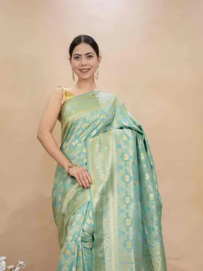 This pastel blue Banarasi silk saree is a picture of grace. The intricate gold weaving and soft color make it a beautiful choice for weddings, now made effortless as a 1-Minute Saree.