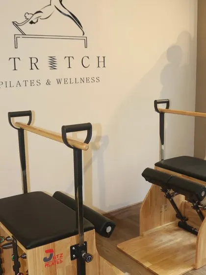 A close-up of our stability chairs and the studio logo. We have a variety of equipment to keep your workouts challenging and fresh.
