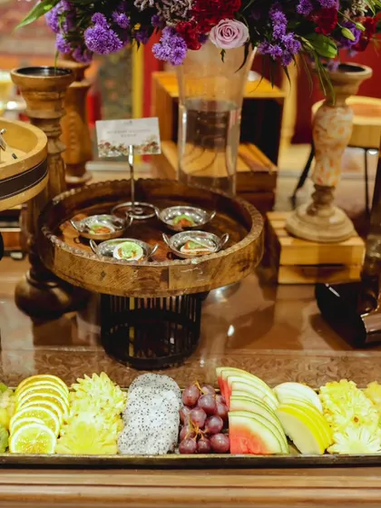 A wide view of our appetizer and fruit spread for a corporate event, demonstrating how we combine different elements to create a balanced and visually appealing buffet table.