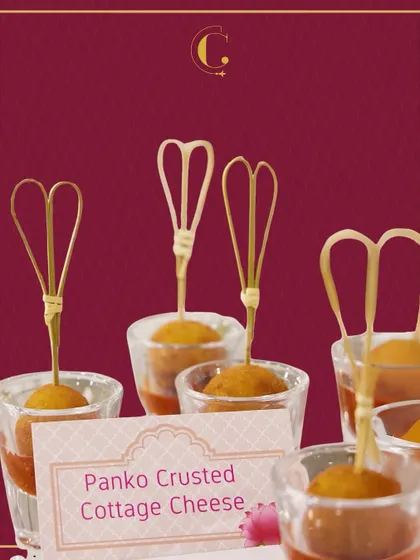 Panko Crusted Cottage Cheese bites served in shot glasses with a tangy dipping sauce. The combination of the crispy panko exterior and soft paneer interior is a textural delight.