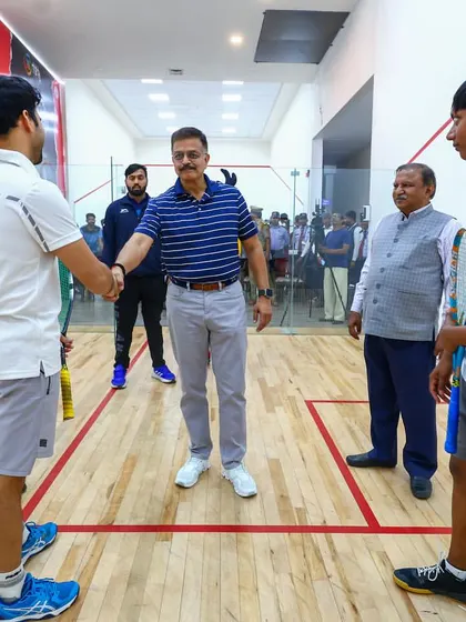 Shaking hands with IPS Alok Singh after a tournament win in Kanpur. I believe in sportsmanship and respect.