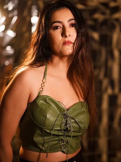 Another angle from this edgy fashion shoot. The lighting is carefully controlled to create highlights and shadows that define the mood.