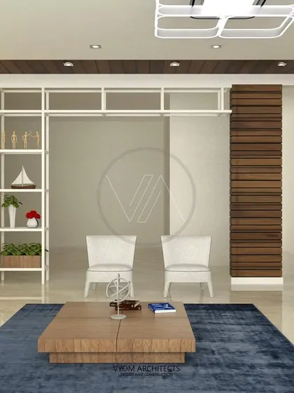 Another view of the living room from image 61, showing the partition and a pop of yellow. The design uses simple geometry and materials to create a modern and functional space.