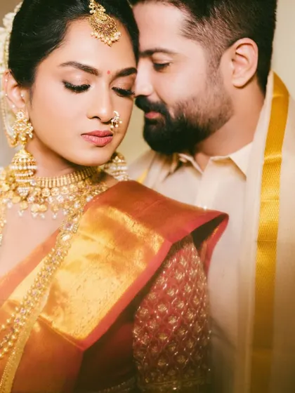 A tender and intimate close-up of the couple. This portrait captures the quiet connection and love between them in a soft, artistic style.