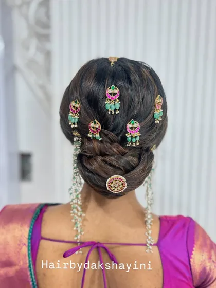 Another angle of the intricate updo with temple jewellery, showing the beautiful craftsmanship.