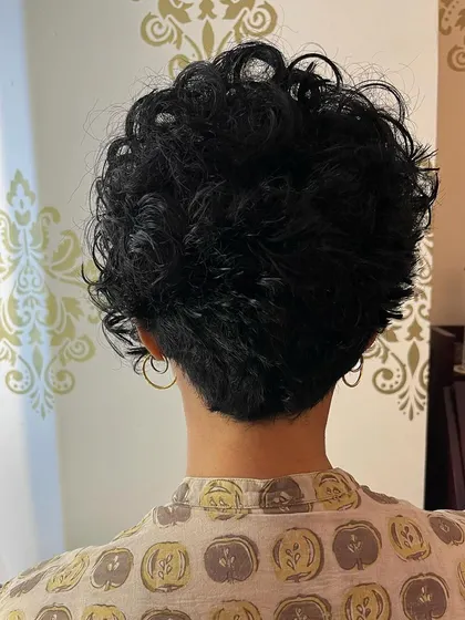 The back of the pixie bob, showing the tapered shape that gives the cut its structure.