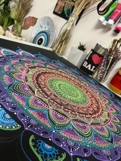 A close-up of a large mandala in progress on my desk.
