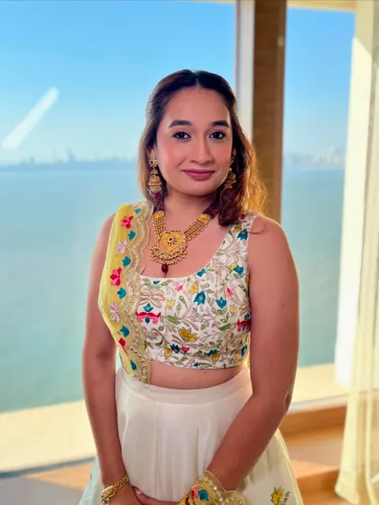 Another shot of the bridesmaid, looking fresh and beautiful against the sea-view backdrop.