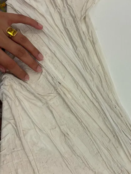 A close-up of the fabric texture on the canvas. It's amazing what you can create with simple materials like cloth and glue.