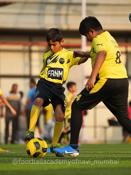 Another great example of a 1-on-1 challenge, where a player learns to shield the ball and maintain possession under pressure.
