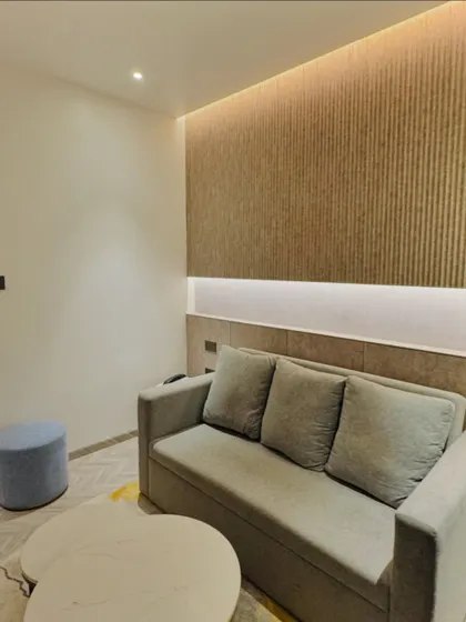 We also check for extra comforts like a sofa or seating area within the hotel rooms, ensuring there is ample space for guests to relax.